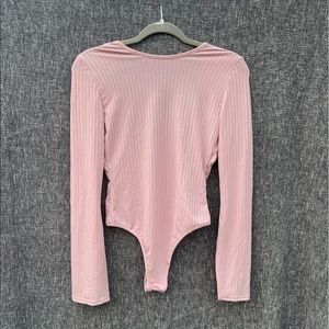 BooHoo size 2 ribbed backless body suit in pink